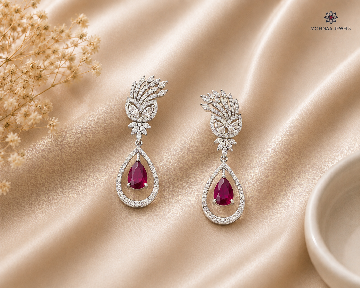 IRA Crimson Bloom Earrings crafted in rhodium-plated 925 sterling silver featuring AAA+ quality stones and a crimson pear-cut centerpiece.