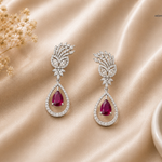 IRA Crimson Bloom Earrings crafted in rhodium-plated 925 sterling silver featuring AAA+ quality stones and a crimson pear-cut centerpiece.
