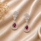 IRA Crimson Bloom Earrings crafted in rhodium-plated 925 sterling silver featuring AAA+ quality stones and a crimson pear-cut centerpiece.