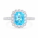 925 sterling silver ring with emerald-cut blue AAA+ cubic zirconia and sparkling CZ halo from the Ira Collection.