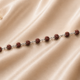 Rudra Sutra Bracelet crafted in 925 sterling silver with natural Rudraksha beads from the Virasat Collection by Mohnaa Jewels.