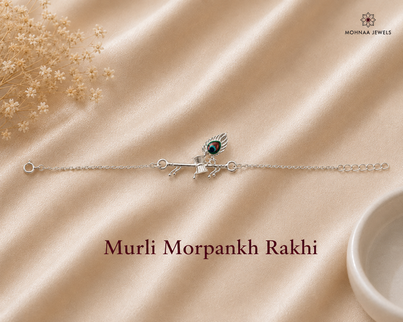 "Murli Morpankh Rakhi crafted in 925 sterling silver featuring Lord Krishna's flute and peacock feather motif with colorful enamel detailing and an adjustable silver chain by Mohnaa Jewels.