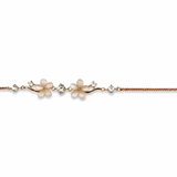 Blush Blossom 925 sterling silver bracelet featuring delicate floral motifs, sparkling cubic zirconia accents, and an adjustable chain in a polished silver finish.