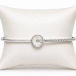IRA Celeste Orbit Bracelet crafted in 925 sterling silver featuring a circular centerpiece with sparkling CZ accents and a contemporary minimalist design.