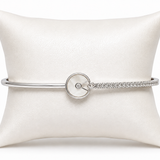 IRA Celeste Orbit Bracelet crafted in 925 sterling silver featuring a circular centerpiece with sparkling CZ accents and a contemporary minimalist design.