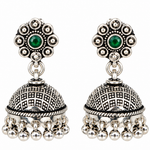 Mohnaa Panna Pushpa Silver Jhumka Earrings in 925 sterling silver featuring emerald green stone floral studs and handcrafted oxidized jhumka design.