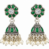 Mohnaa Haritika Silver Jhumka Earrings crafted in 925 sterling silver featuring green and white CZ floral detailing with traditional handcrafted jhumka design.