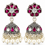 Mohnaa Pushparagini 925 sterling silver jhumka earrings with ruby pink and white cubic zirconia accents, handcrafted traditional ethnic jewelry for Navratri and festive wear.