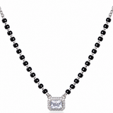 Mohnaa Samaira 925 sterling silver mangalsutra featuring a rectangular cushion-style centre stone with a sparkling halo pendant and black-bead chain on a white background.
