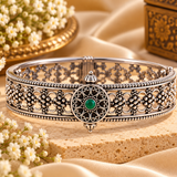 Mehera Filigree Kada in 925 sterling silver with intricate floral filigree design and green center stone