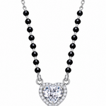 Mohnaa Aashvi 925 sterling silver mangalsutra featuring a heart-shaped centre stone pendant with a sparkling halo and faceted black beads on a white background.