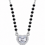 Mohnaa Aashvi 925 sterling silver mangalsutra featuring a heart-shaped centre stone pendant with a sparkling halo and faceted black beads on a white background.