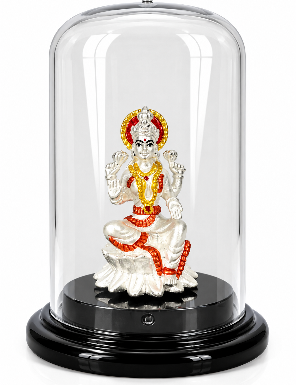 Silver-plated Goddess Lakshmi idol with red and golden accents under a transparent dome on a black display base
