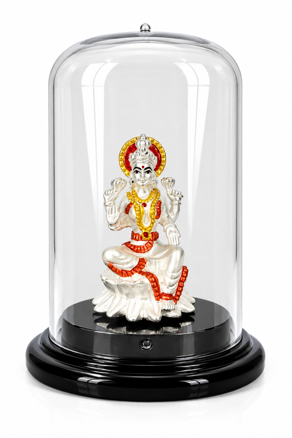 Silver-plated Goddess Lakshmi idol with red and golden accents under a transparent dome on a black display base