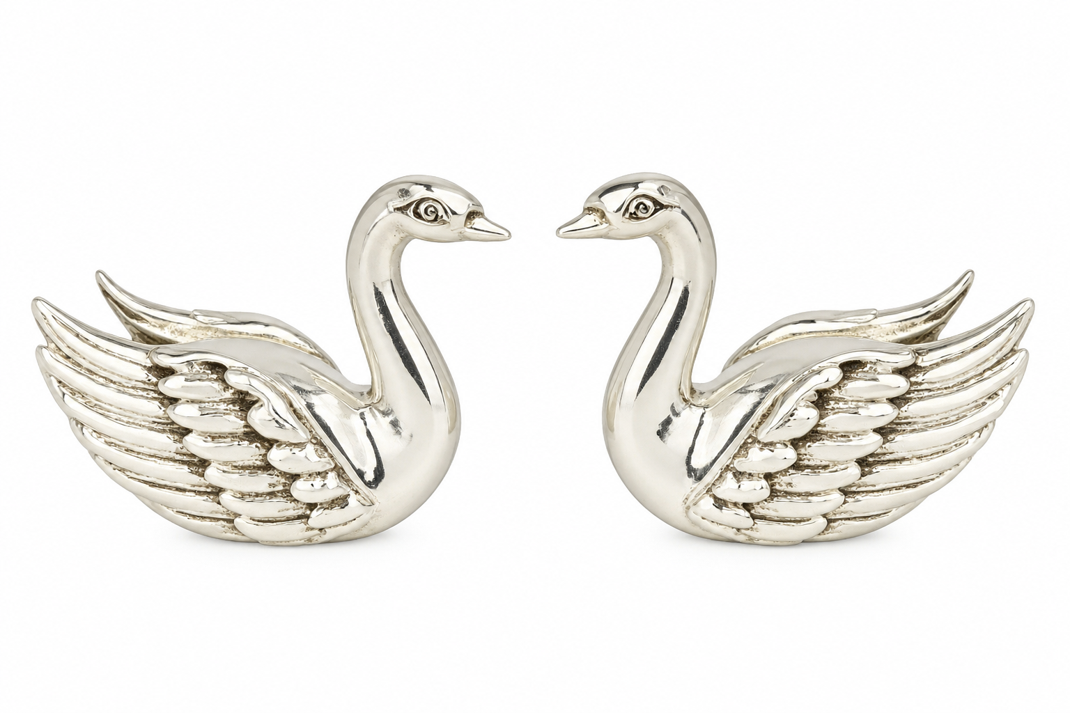 Mohnaa Eternal Swans decorative figurines set of two in genuine 925 sterling silver, featuring intricately sculpted wings and polished silver finish on a white background.