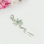 Modern Flower Pendent With Blue Topaz Gemstone In Solid Sterling Silver
