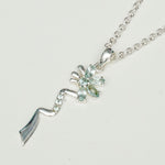 Modern Flower Pendent With Blue Topaz Gemstone In Solid Sterling Silver