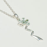 Modern Flower Pendent With Blue Topaz Gemstone In Solid Sterling Silver