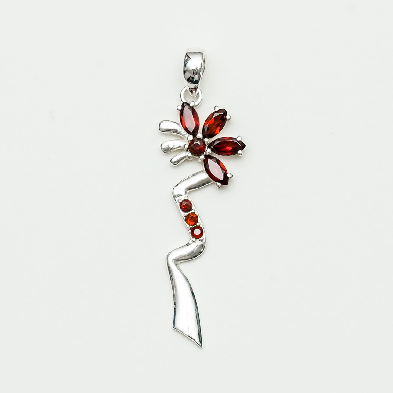 Modern Flower Pendent With Garnet Gemstone In Solid Sterling Silver