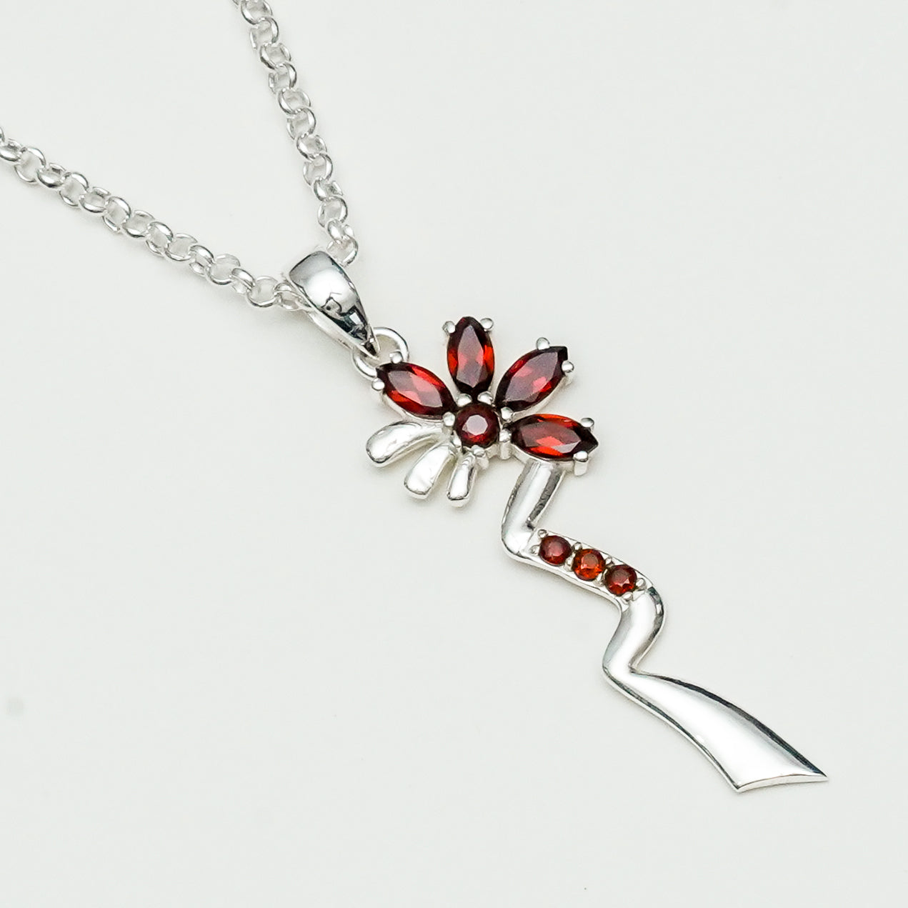 Modern Flower Pendent With Garnet Gemstone In Solid Sterling Silver