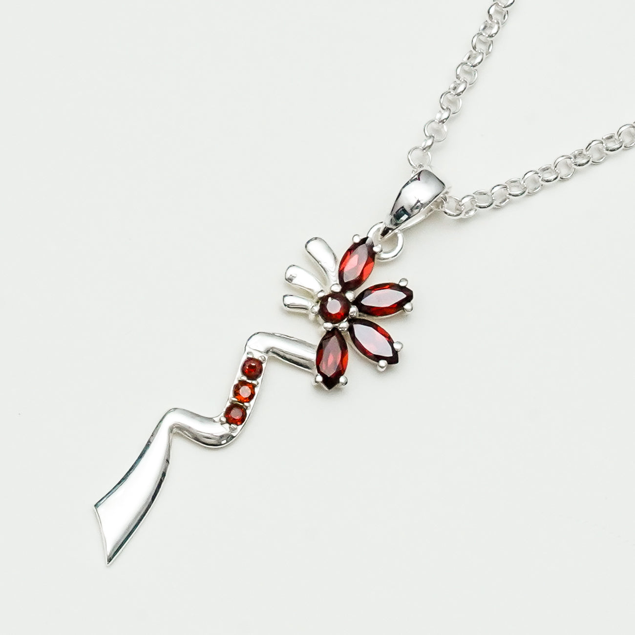 Modern Flower Pendent With Garnet Gemstone In Solid Sterling Silver