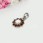 Mohnaa Flower Pendant With Garnet Gemstone In Fine Sterling Silver
