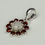 Mohnaa Flower Pendant With Garnet Gemstone In Fine Sterling Silver