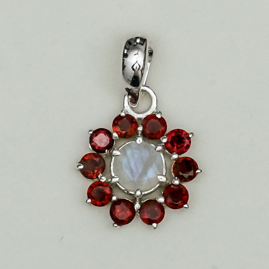 Mohnaa Flower Pendant With Garnet Gemstone In Fine Sterling Silver