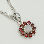 Mohnaa Flower Pendant With Garnet Gemstone In Fine Sterling Silver