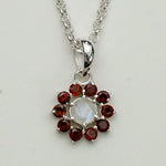Mohnaa Flower Pendant With Garnet Gemstone In Fine Sterling Silver