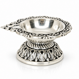Top view of Mohnaa Shreepad sterling silver diya showing the decorative scalloped rim, polished inner bowl, and traditional ornamental design.