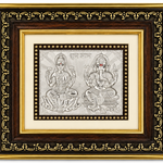 Lakshmi Ganesha silver-tone relief artwork with Shubh Labh inscription in an ornate black and gold decorative frame by Mohnaa Jewels