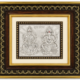 Lakshmi Ganesha silver-tone relief artwork with Shubh Labh inscription in an ornate black and gold decorative frame by Mohnaa Jewels