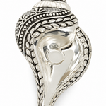 Mohnaa Jyotika 925 sterling silver ornate diya featuring an elongated flame-inspired bowl, decorative beaded borders, and an intricately patterned pedestal on a white background.