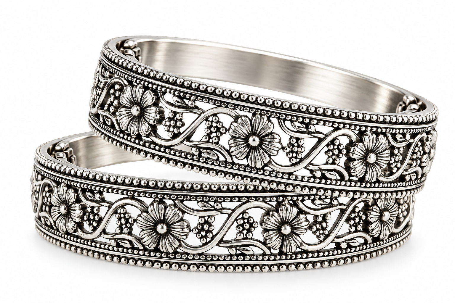 Handcrafted 925 sterling silver Kusum Valli floral bangles featuring blooming flower motifs, vine detailing, and elegant heritage craftsmanship by Mohnaa Jewels