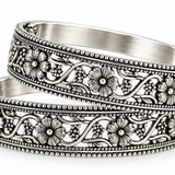 Handcrafted 925 sterling silver Kusum Valli floral bangles featuring blooming flower motifs, vine detailing, and elegant heritage craftsmanship by Mohnaa Jewels