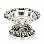 Top view of Mohnaa Shreekamal sterling silver diya showing its polished bowl and ornate scalloped rim with traditional decorative detailing.