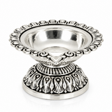 Top view of Mohnaa Shreekamal sterling silver diya showing its polished bowl and ornate scalloped rim with traditional decorative detailing.