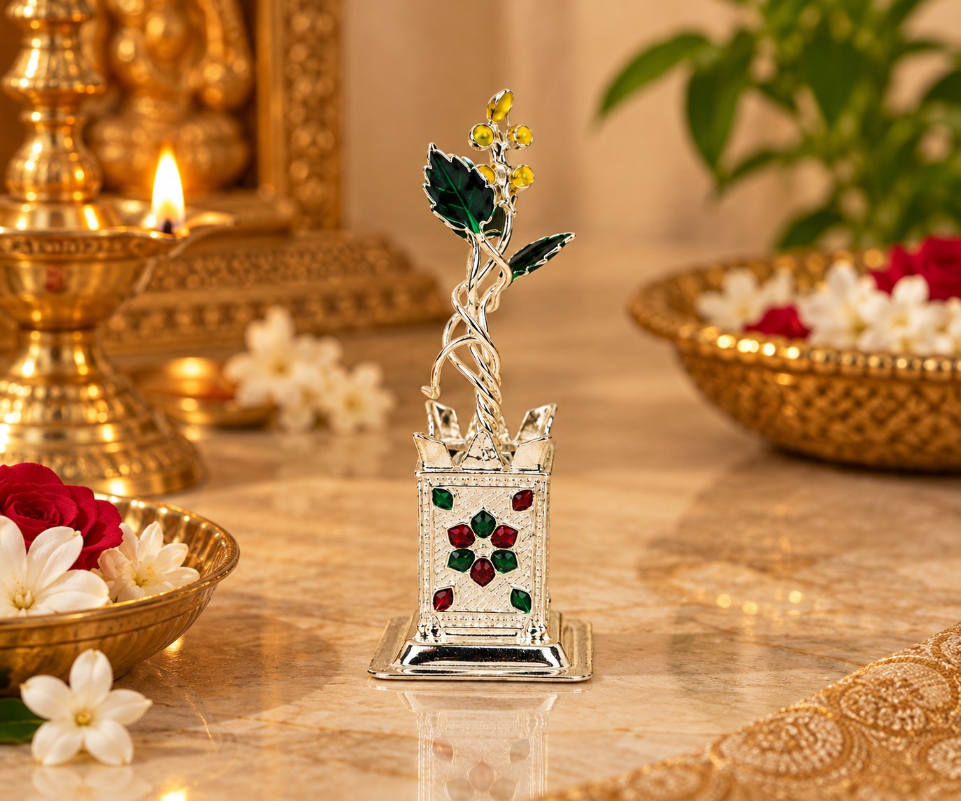 Mohnaa Tulsi Kyara silver decorative planter displayed in a traditional festive pooja setting.