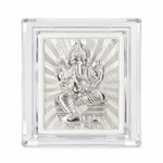 Silver-toned Lord Ganesha decorative relief artwork with a radiant patterned background inside a transparent rectangular display case