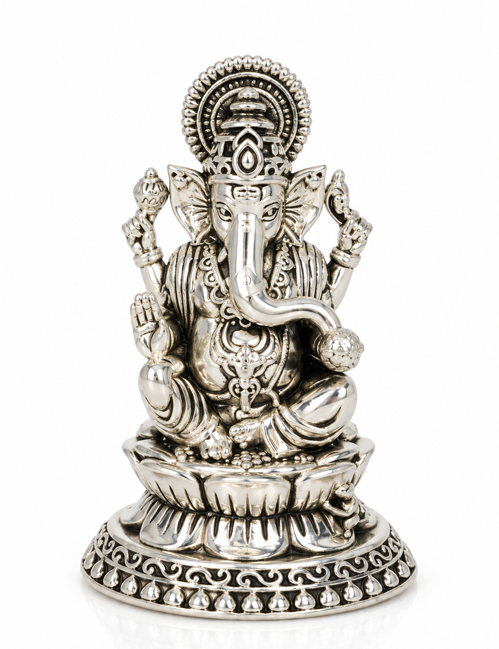Traditional seated Lord Ganesha idol with ornate detailing and decorative lotus pedestal in silver finish