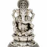 Traditional seated Lord Ganesha idol with ornate detailing and decorative lotus pedestal in silver finish