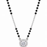 Mohnaa Aaira 925 sterling silver mangalsutra featuring a round centre stone pendant with a sparkling double halo and faceted black beads on a white background.