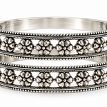 Handcrafted 925 sterling silver floral bangles pair featuring intricate flower motifs and openwork heritage design by Mohnaa Jewels