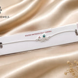 "Premium Radha Krishna Divine 925 Silver Rakhi with peacock feather motif and personalized name design."