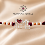 "Eternal Bond Silver Rakhi featuring an elegant 'I Love My Brother' charm with heart motif, handcrafted on a premium thread with decorative beads, perfect Raksha Bandhan gift for brother by Mohnaa Jewels."