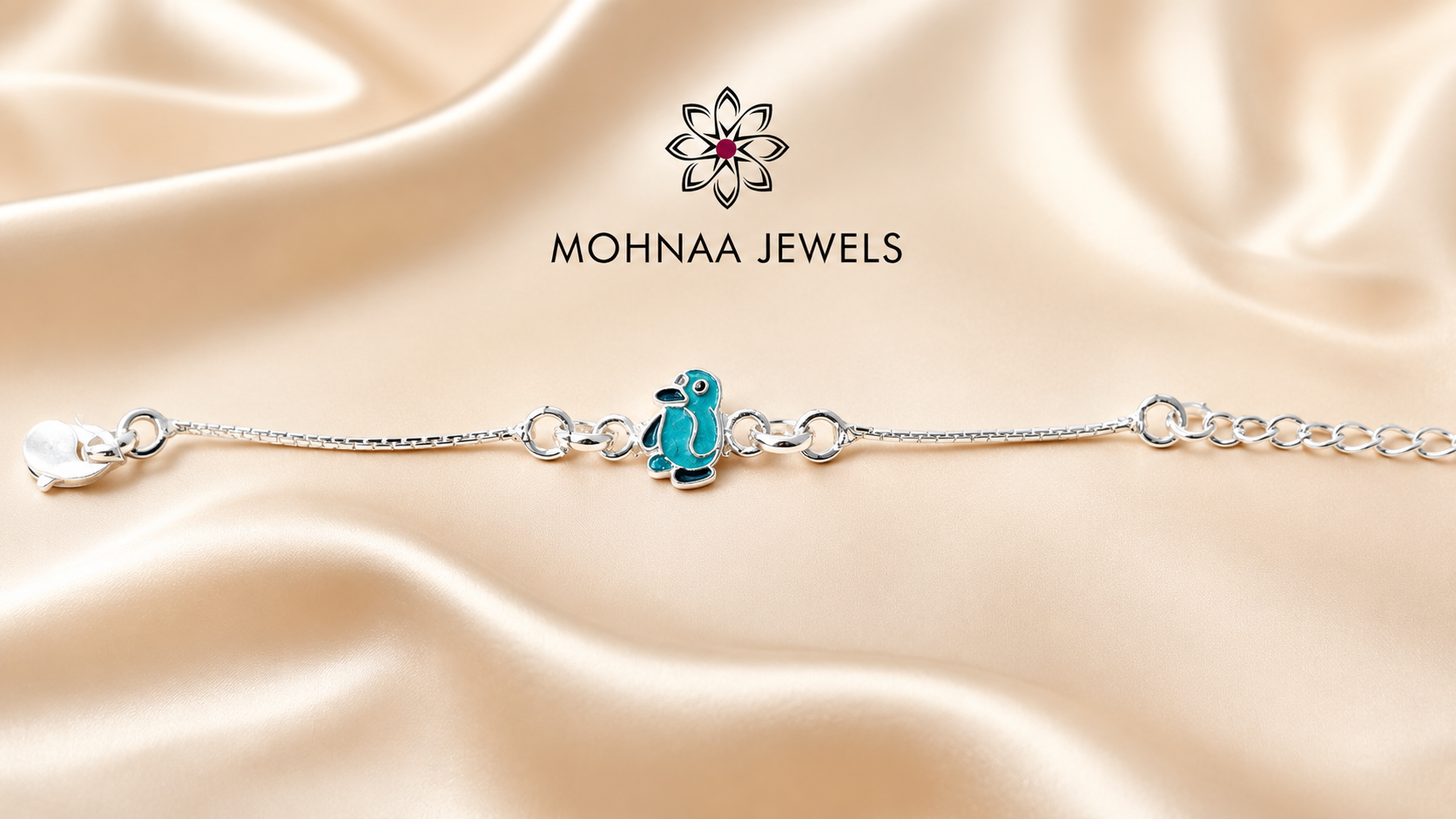Cute blue penguin charm 925 sterling silver rakhi bracelet with adjustable silver chain by Mohnaa Jewels