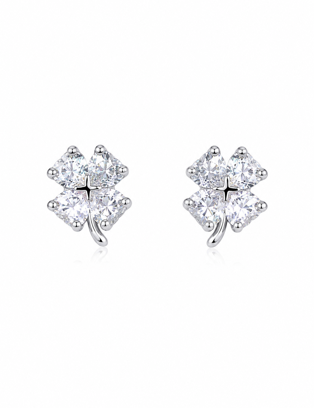 925 sterling silver lucky clover stud earrings featuring sparkling cubic zirconia stones and rhodium plating.