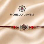 Cute Bro designer rakhi with decorative red beads and premium thread for Raksha Bandhan