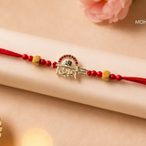 Shiv Shakti Silver Rakhi with sacred Shiv-inspired motif and red thread by Mohnaa Jewels